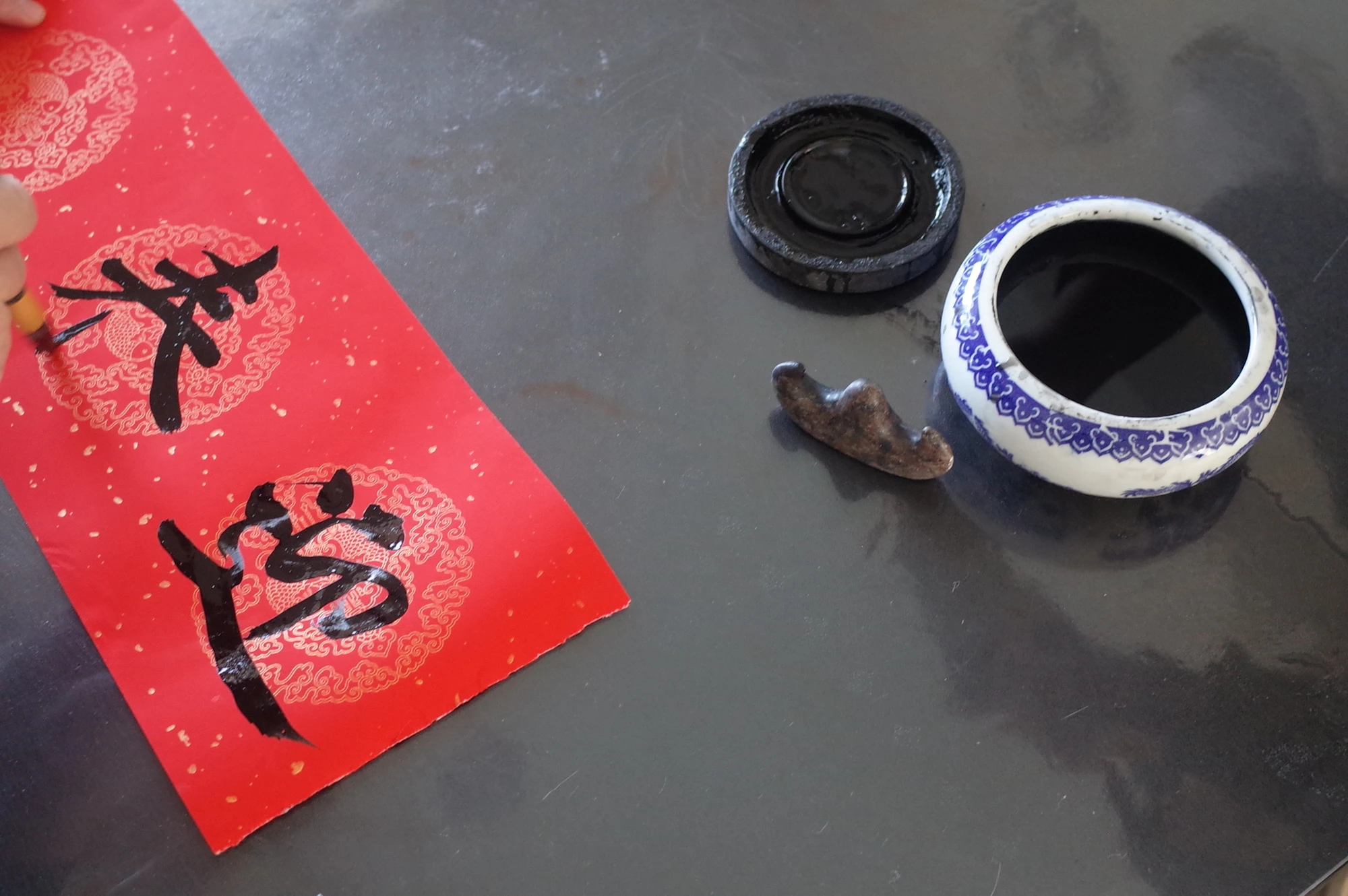 Calligraphy still life with ink and paper