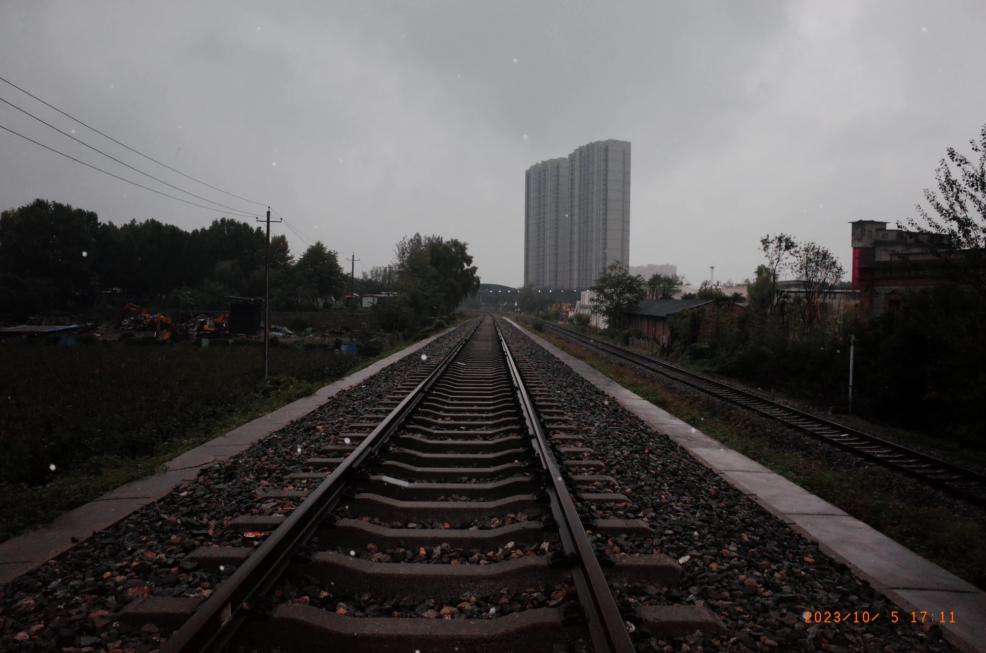 Railway tracks leading toward the city